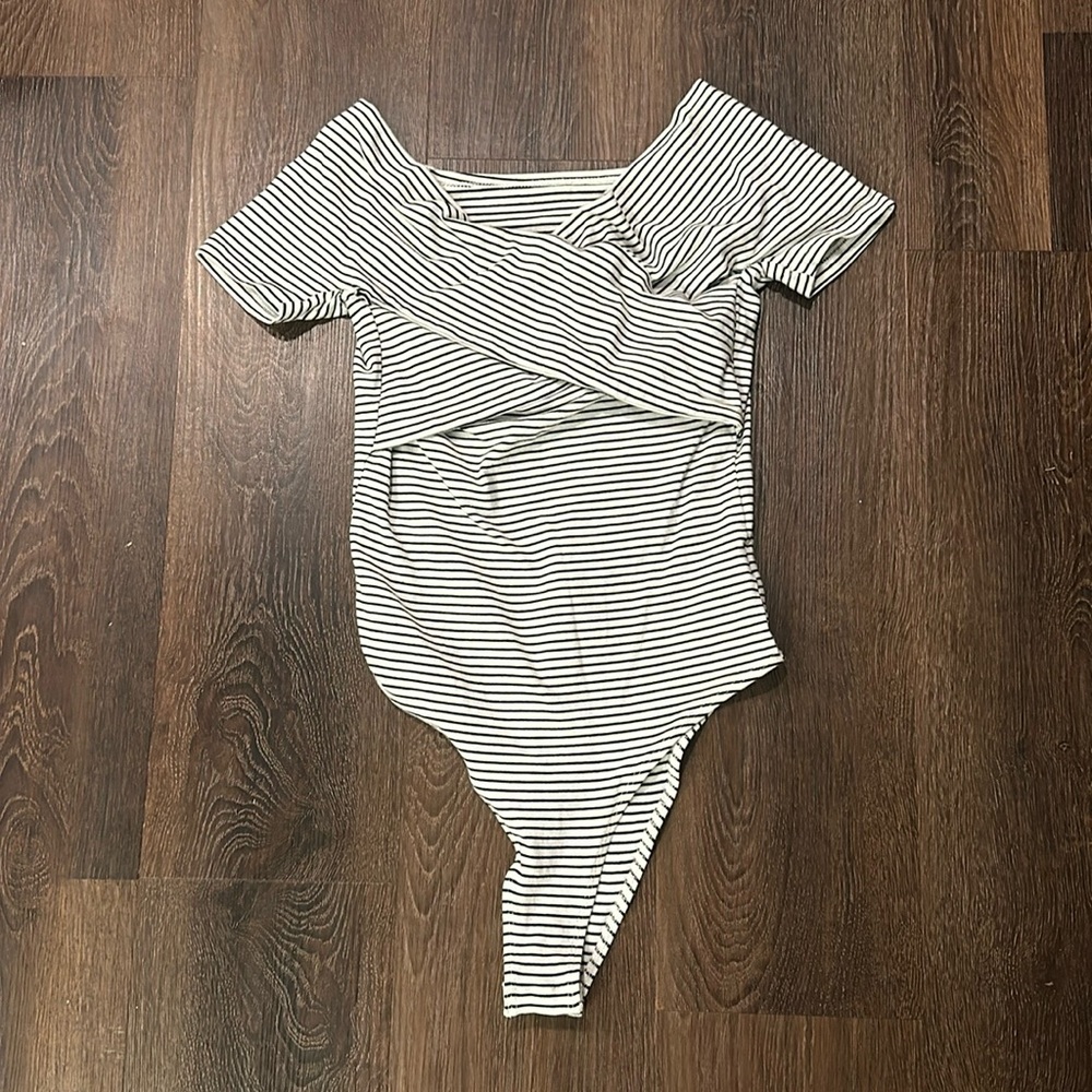 Black and cream bodysuit, fits like a small